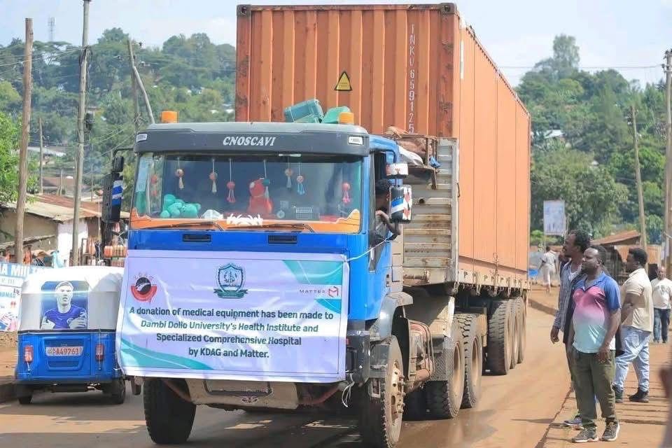 CNOSCAVI truck carrying the KDAG and MATTER medical supply shipping container through Dambi Dollo